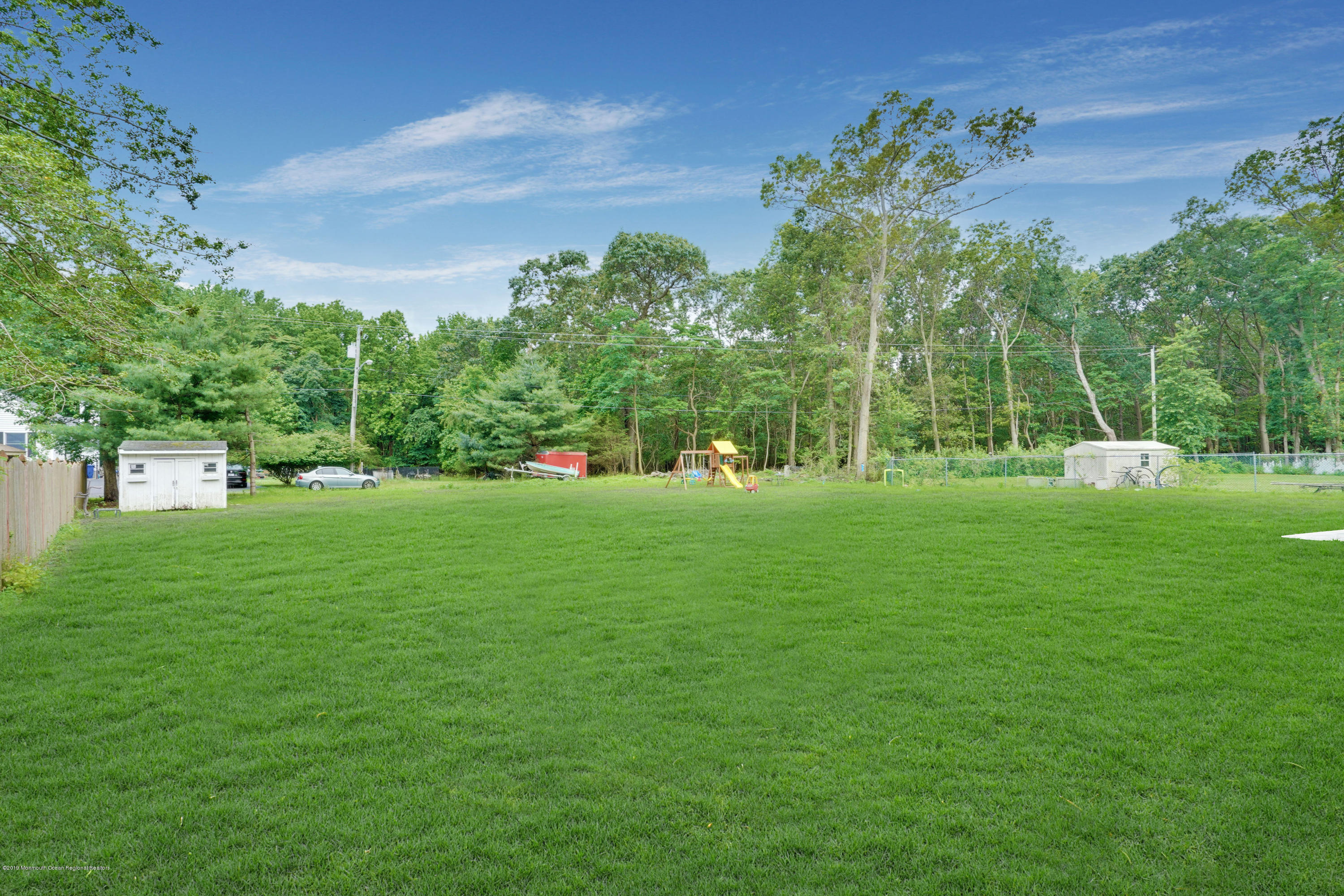 5 Ash Street Eatontown, NJ 07724 - Photo 27 of 31 a view of a park with large trees