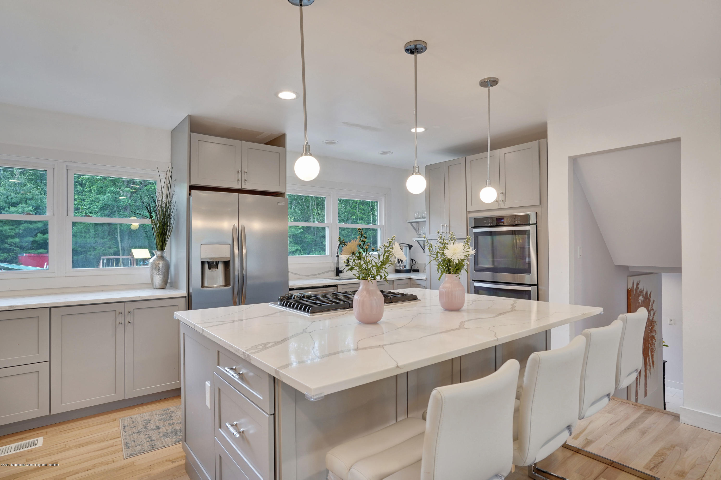 5 Ash Street Eatontown, NJ 07724 - Photo 4 of 31 a kitchen with stainless steel appliances granite countertop a sink a stove a refrigerator and island