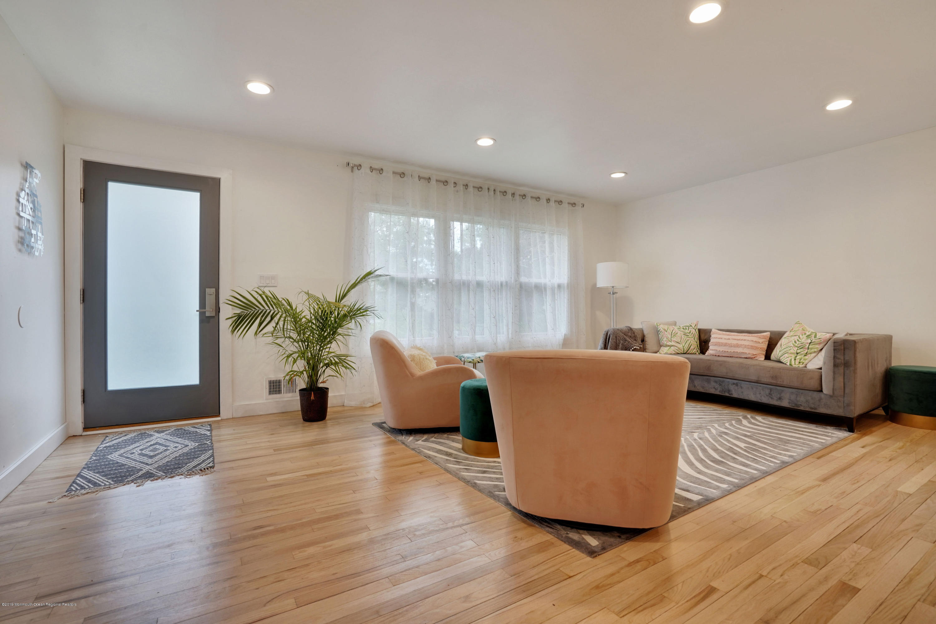 5 Ash Street Eatontown, NJ 07724 - Photo 7 of 31 a living room with furniture and a wooden floor