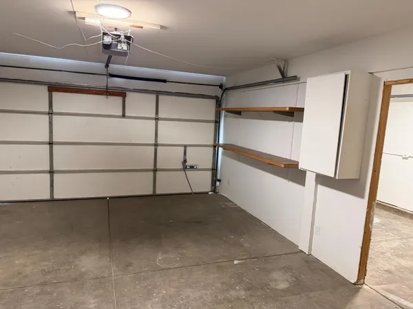 a view of a room with racks on the wall