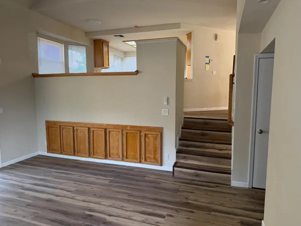 a view of entryway with wooden floor