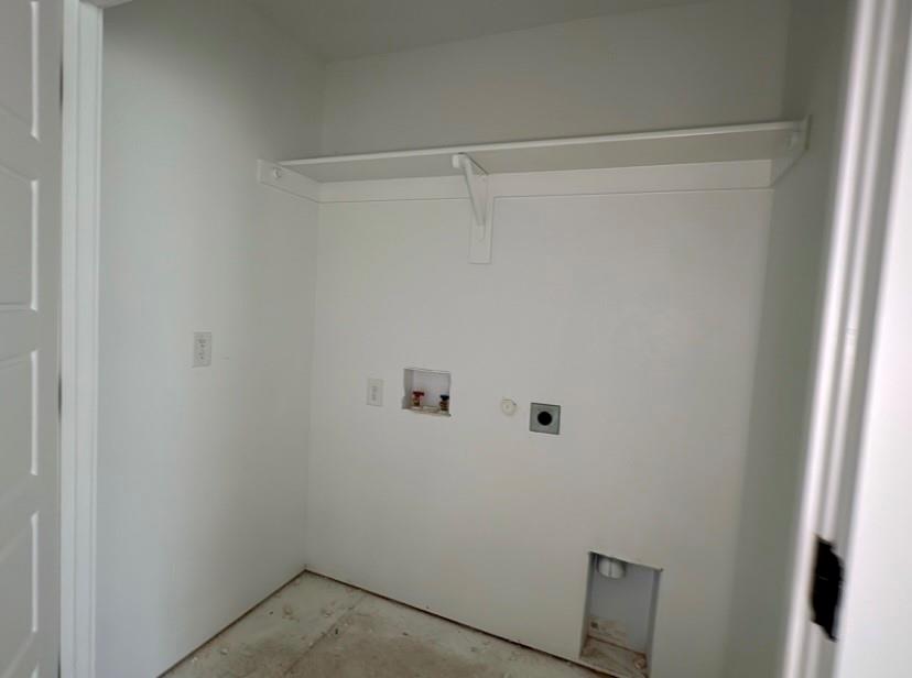 9475 Timberleaf Drive Dallas, TX 75243 - Photo 15 of 23 Laundry room with hookup for a washing machine and hookup for an electric dryer