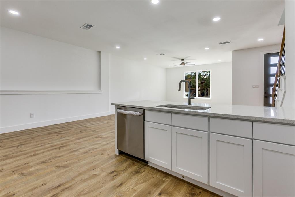 9475 Timberleaf Drive Dallas, TX 75243 - Photo 17 of 38 a bathroom with a sink and a mirror