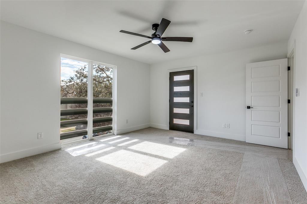 9475 Timberleaf Drive Dallas, TX 75243 - Photo 24 of 38 a view of an empty room with a window