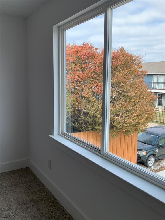 9475 Timberleaf Drive Dallas, TX 75243 - Photo 34 of 38 a view of a room with a large window