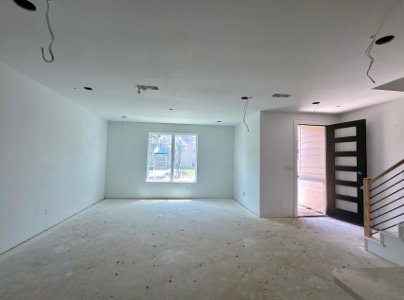 9475 Timberleaf Drive Dallas, TX 75243 - Photo 6 of 23 Empty room with stairway