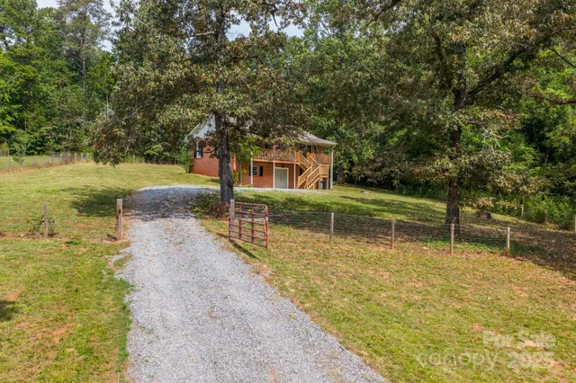 a view of a patio with a yard