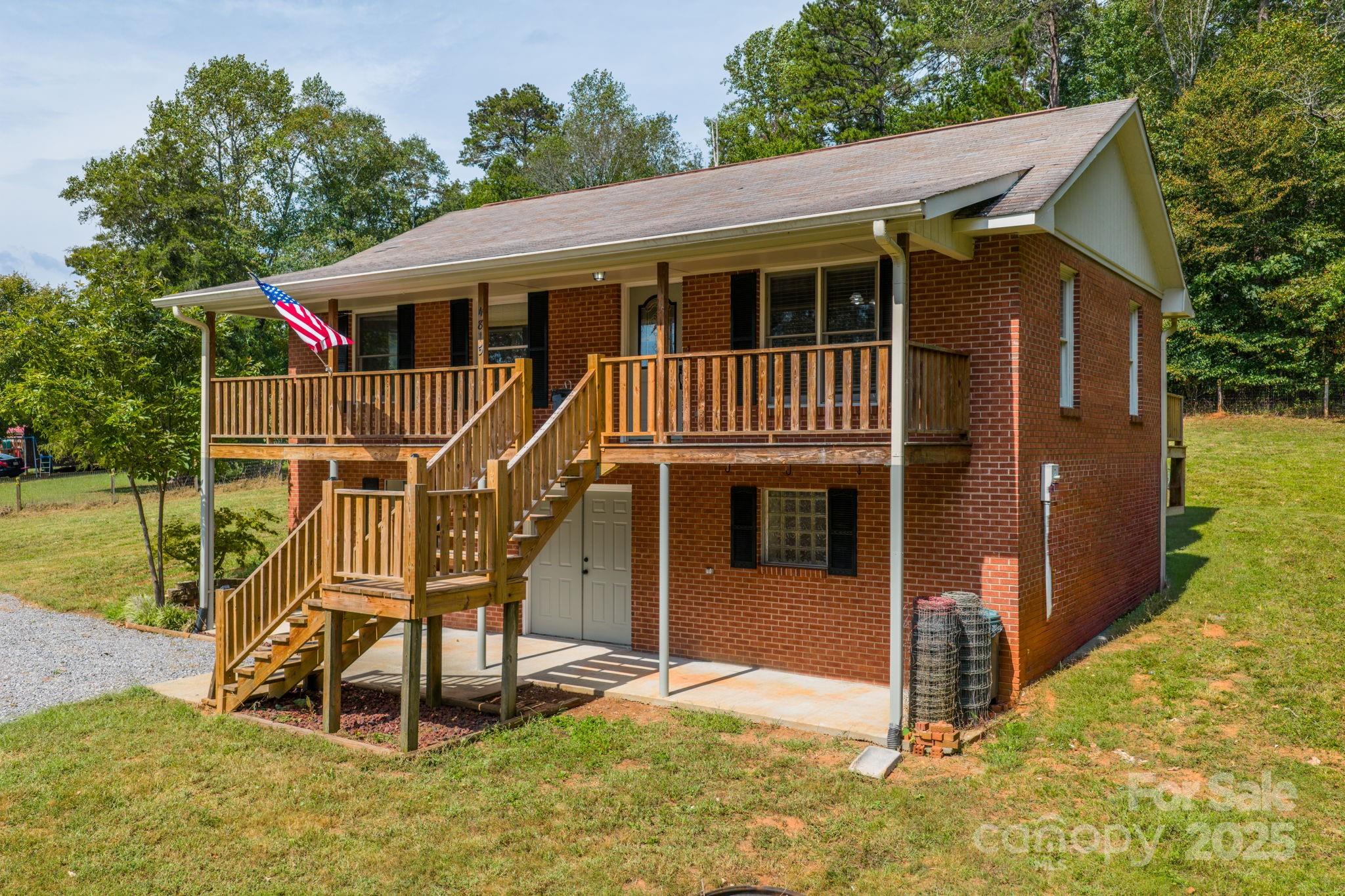 4815 Mt Olive Church Road Morganton, NC 28655 - Photo 6 of 27 a front view of a house with a yard