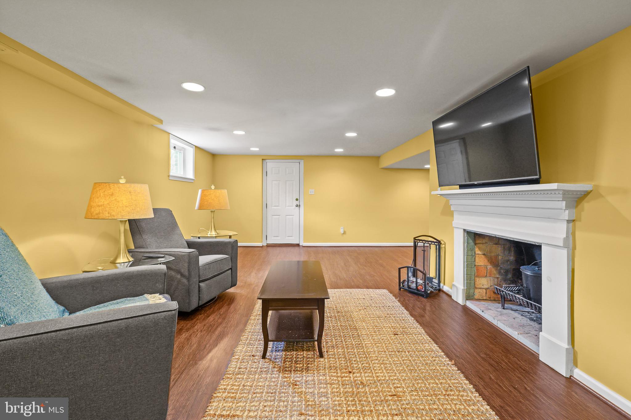 10608 Shady Circle Silver Spring, MD 20903 - Photo 29 of 48 Basement with wood burning fireplace