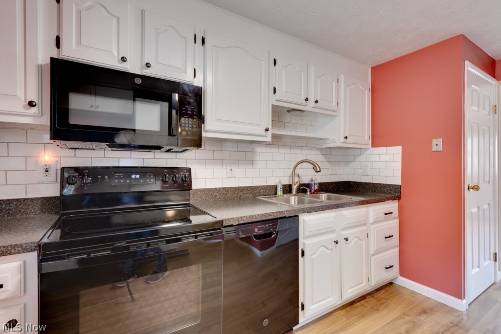 960 Hampton Ridge Drive Akron, OH 44313 - Photo 10 of 22 Work area - White cabinets, appliances updated in 2020