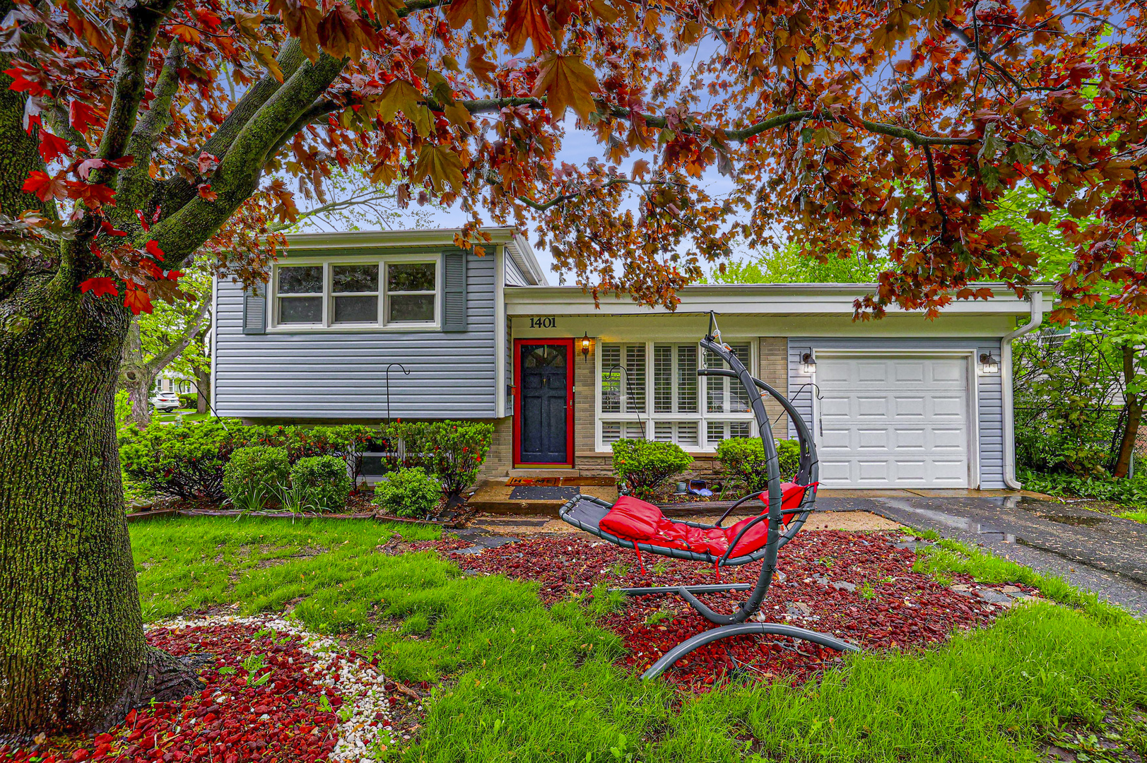 1401 Sunset Ridge Road Northbrook, IL 60062 - Photo 1 of 27 a front view of house with yard and outdoor seating