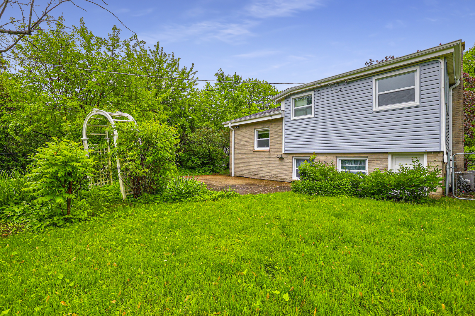 1401 Sunset Ridge Road Northbrook, IL 60062 - Photo 22 of 27 a view of a house with a backyard
