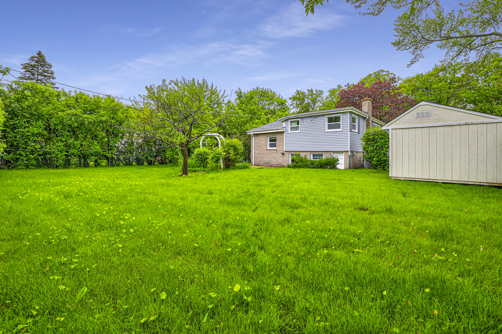 1401 Sunset Ridge Road Northbrook, IL 60062 - Photo 23 of 27 a view of a house with a backyard