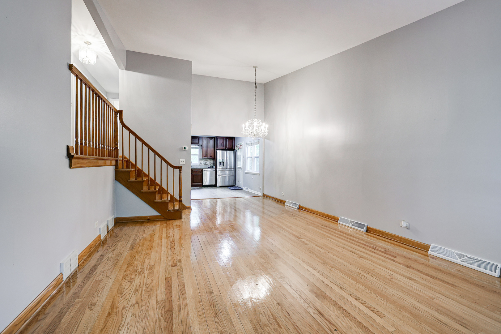 1401 Sunset Ridge Road Northbrook, IL 60062 - Photo 3 of 27 a view of a hallway with wooden floor