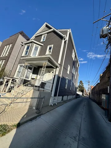 a view of a street with building