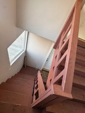 a room with furniture and a window