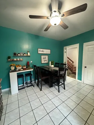 a bathroom with a bathtub a toilet a sink and mirror