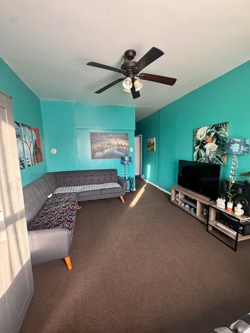 a view of a hallway with front door