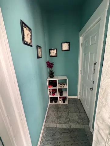 a kitchen with stainless steel appliances granite countertop a refrigerator stove and a sink