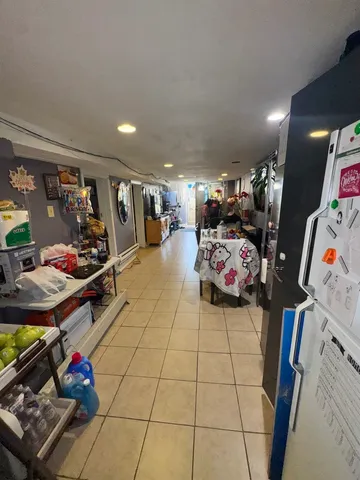 a bedroom with furniture and a bed