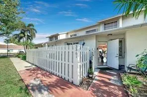 a front view of a house with a porch