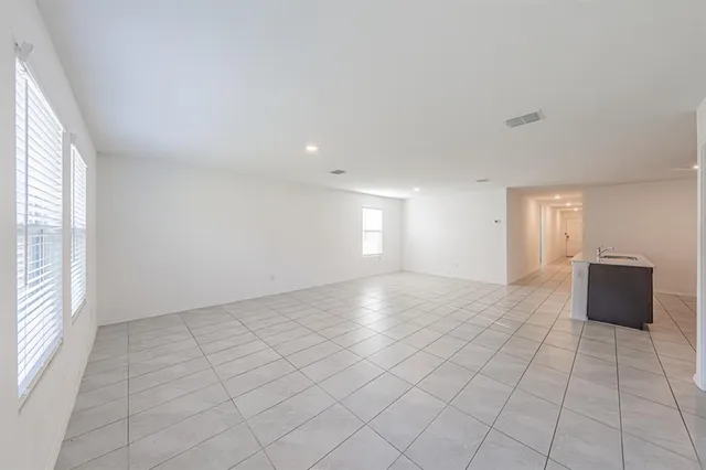 an empty room with windows