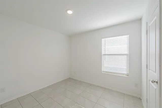 an empty room with a window