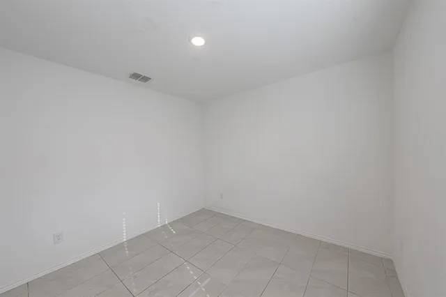 a bathroom with a sink toilet and a mirror