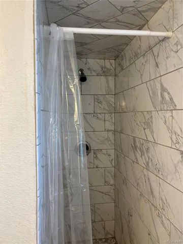 a bathroom with a sink and toilet