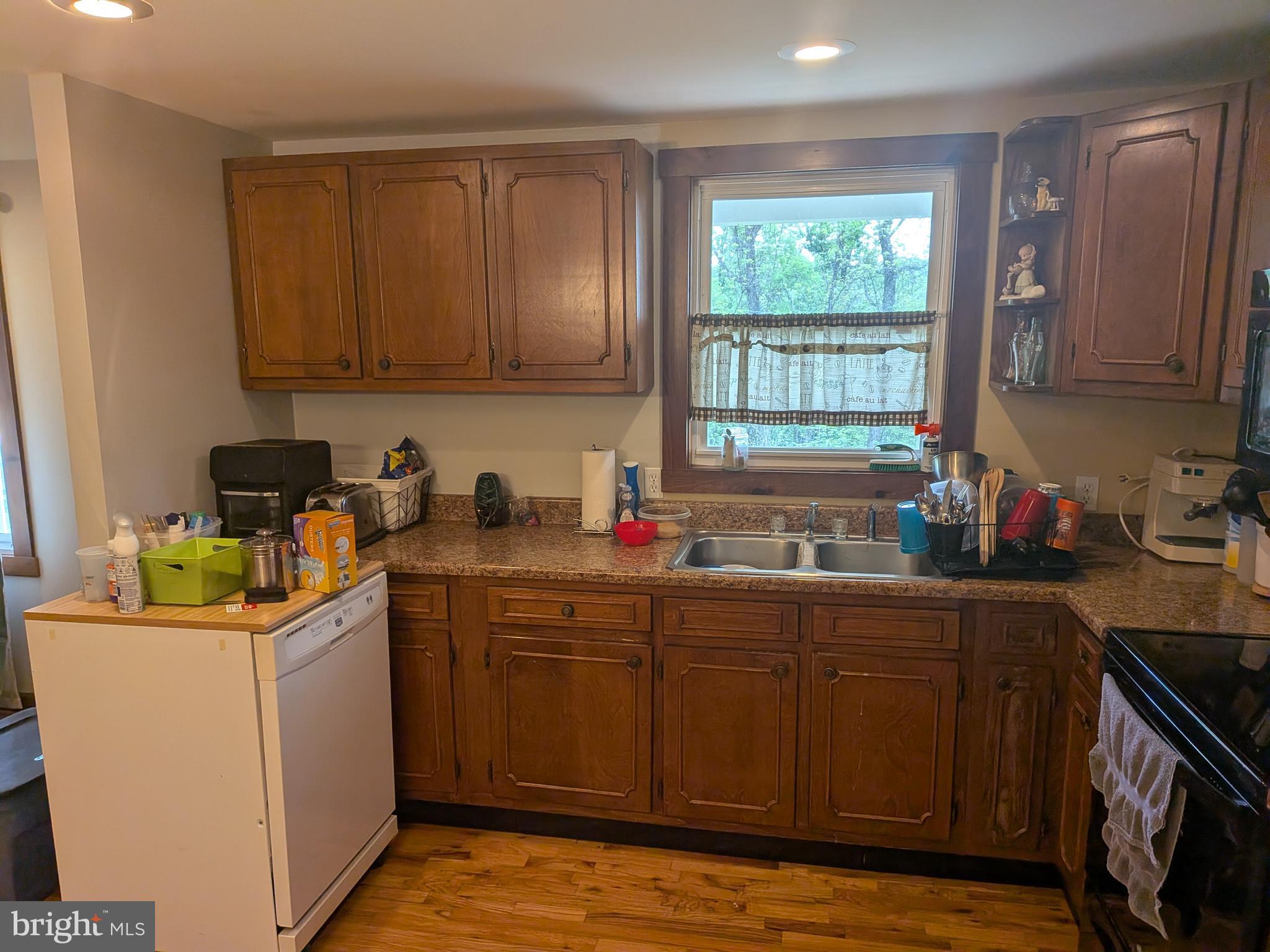 2418 Muddy Run Road Mifflintown, PA 17059 - Photo 17 of 37 a kitchen with a sink cabinets and window