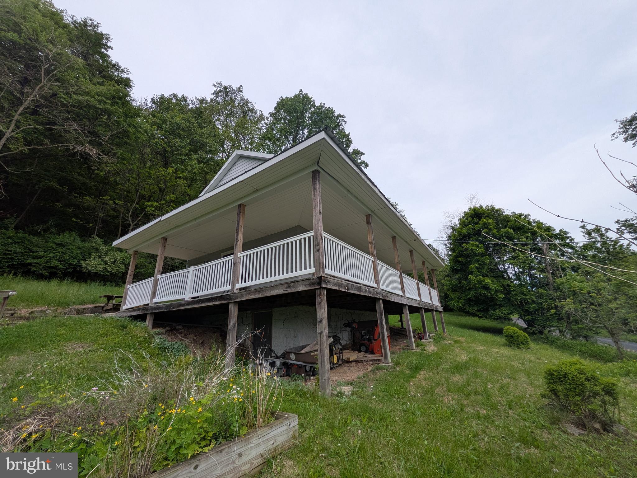 2418 Muddy Run Road Mifflintown, PA 17059 - Photo 2 of 37 a view of a house with a yard