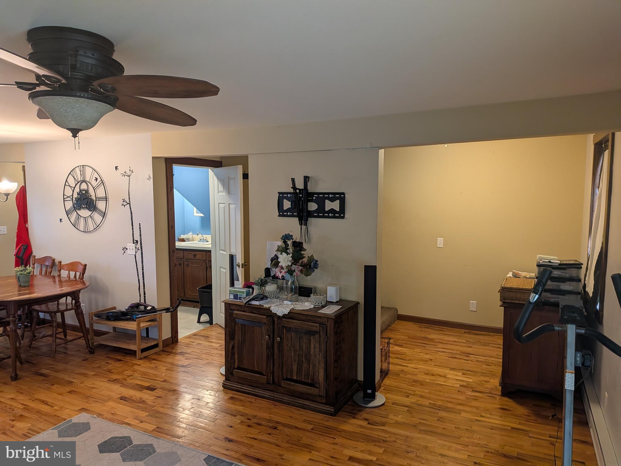 2418 Muddy Run Road Mifflintown, PA 17059 - Photo 23 of 37 a living room with furniture and wooden floor