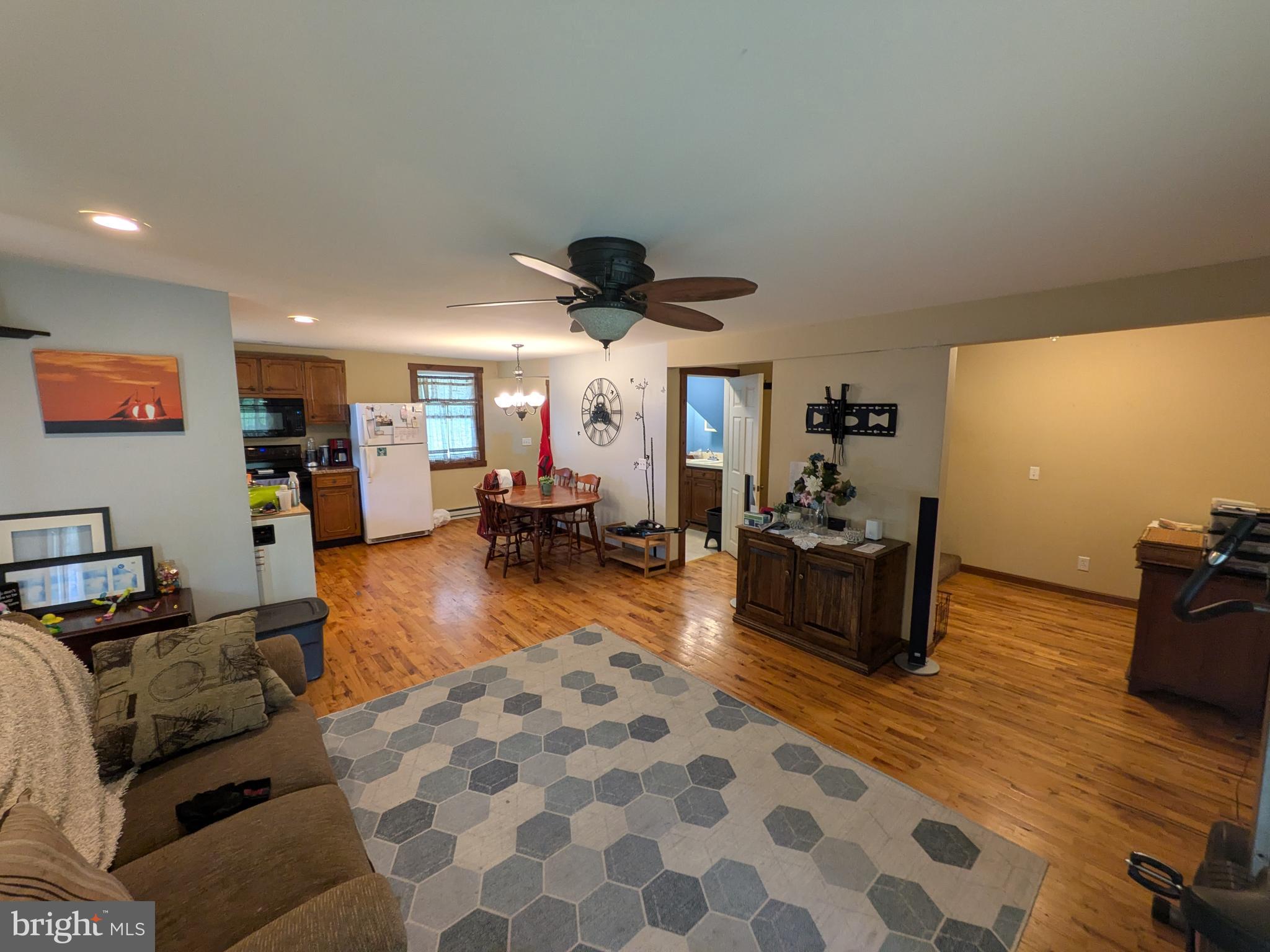 2418 Muddy Run Road Mifflintown, PA 17059 - Photo 25 of 37 a living room with furniture and a flat screen tv