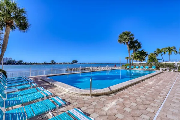 a view of swimming pool from a balcony