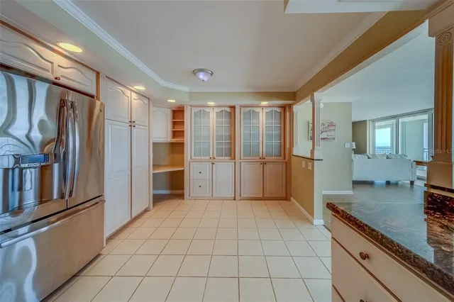 wooden floor in a room with a large window
