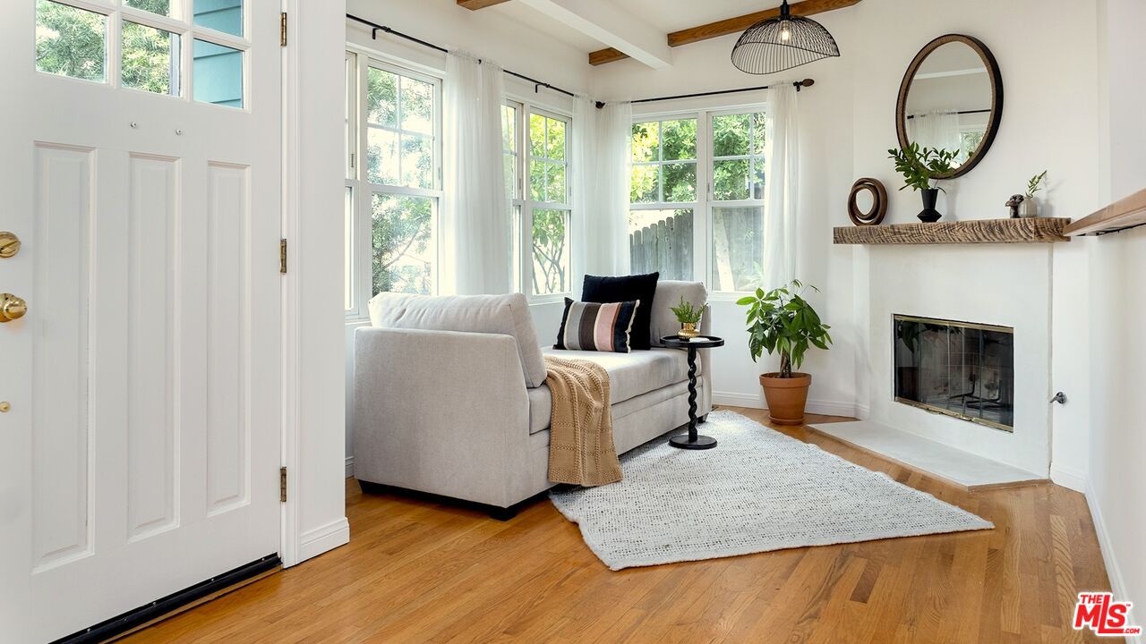 626 Oleander Drive Los Angeles, CA 90042 - Photo 12 of 75 a living room with furniture and a fireplace
