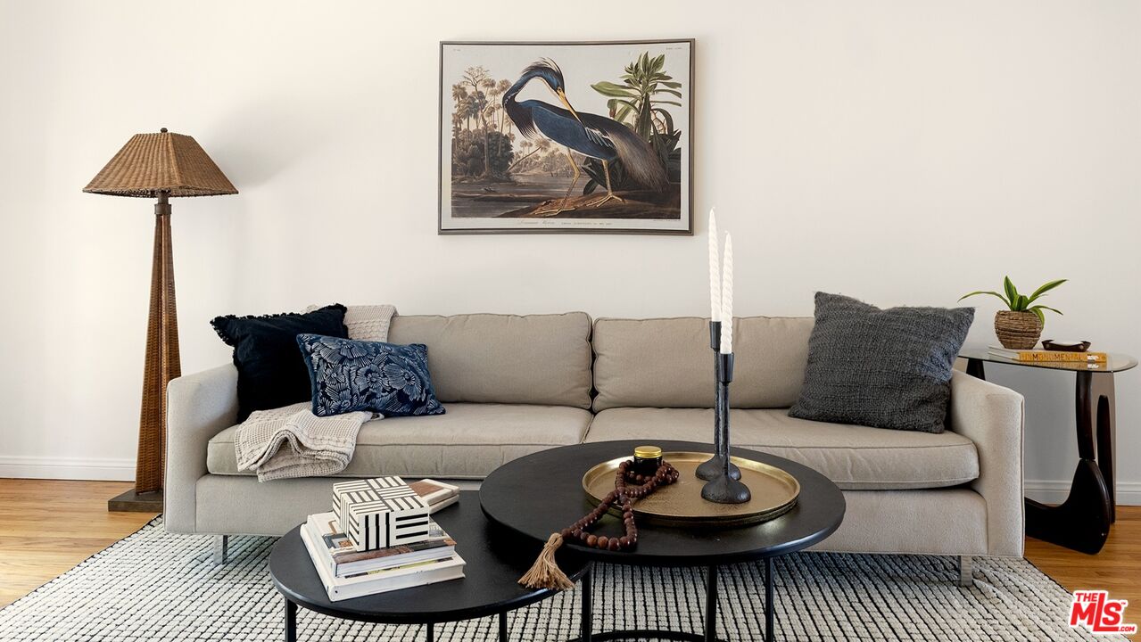 626 Oleander Drive Los Angeles, CA 90042 - Photo 26 of 75 a living room with furniture and a rug