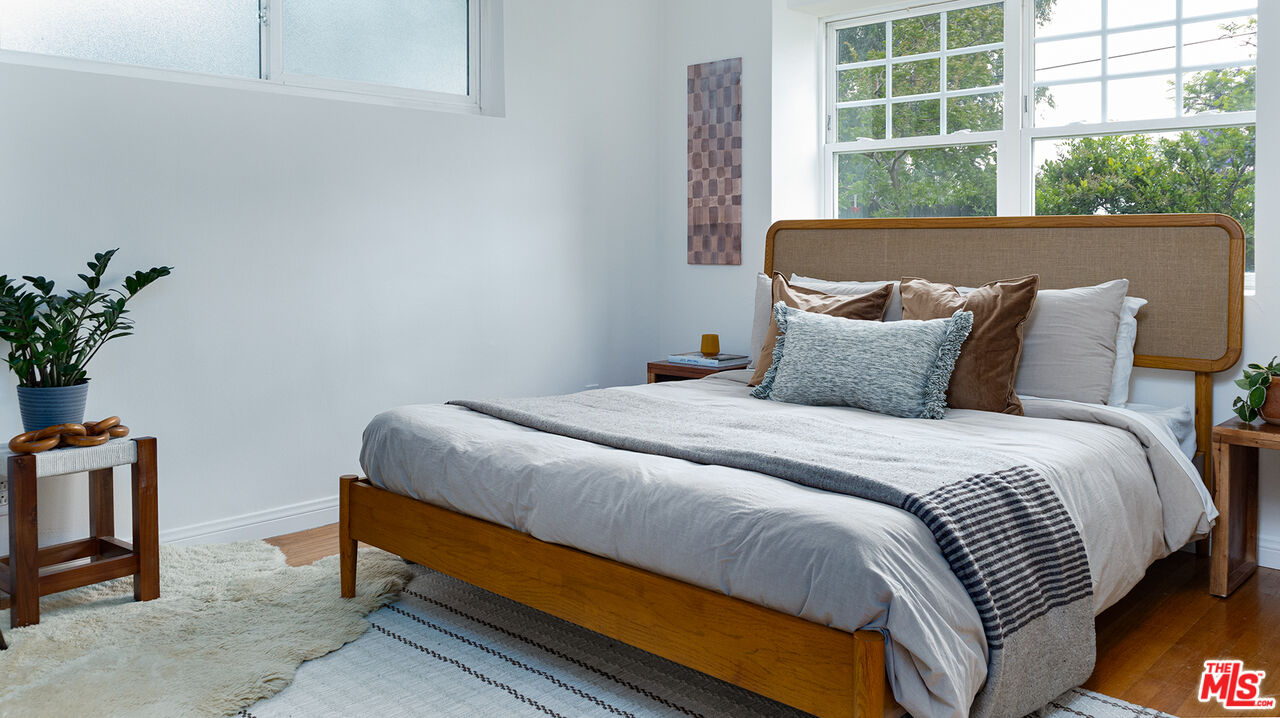 626 Oleander Drive Los Angeles, CA 90042 - Photo 47 of 75 a bedroom with bed and a window
