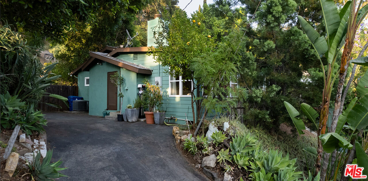 626 Oleander Drive Los Angeles, CA 90042 - Photo 6 of 75 a view of a house with a small yard and plants
