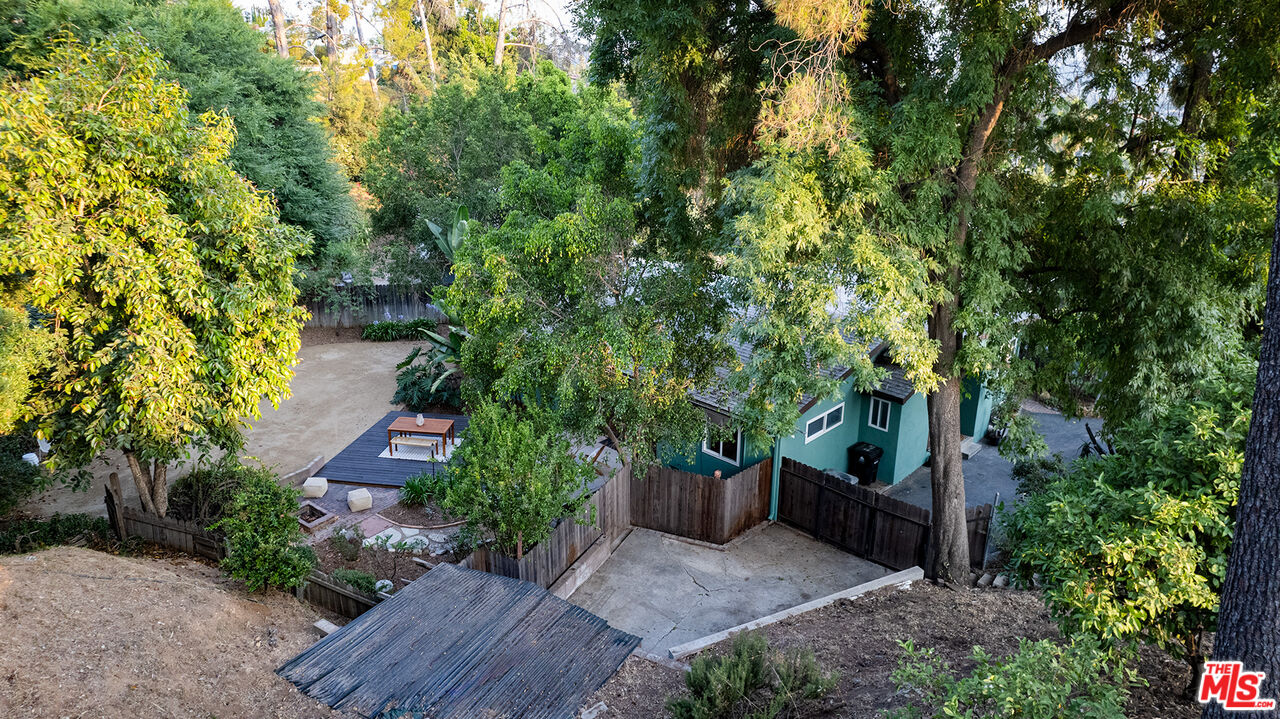 626 Oleander Drive Los Angeles, CA 90042 - Photo 65 of 75 a backyard of a house with lots of green space