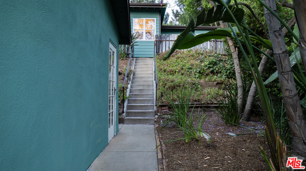 626 Oleander Drive Los Angeles, CA 90042 - Photo 70 of 75 a backyard of a house with lots of green space