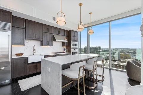 a bathroom with a double vanity sink mirror and double