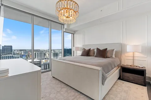a kitchen with granite countertop a sink and cabinets