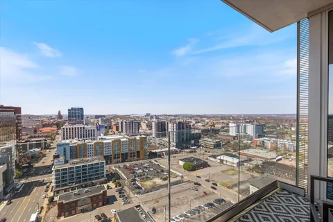 a view of a patio with dining table and chairs with swimming pool