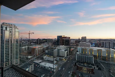 a view of a balcony with city view