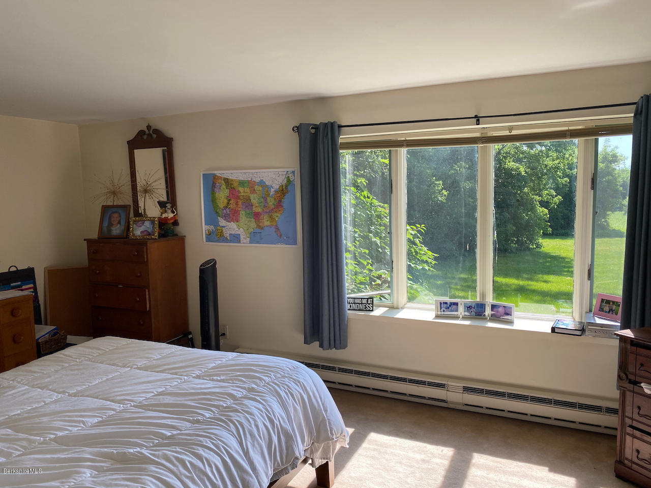 30 Prospect Hill Road Stockbridge, MA 01262 - Photo 13 of 19 a bedroom with a bed and large windows