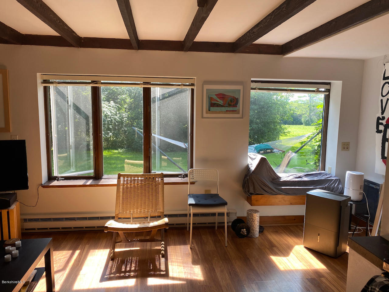 30 Prospect Hill Road Stockbridge, MA 01262 - Photo 15 of 19 a living room with patio furniture and a floor to ceiling window