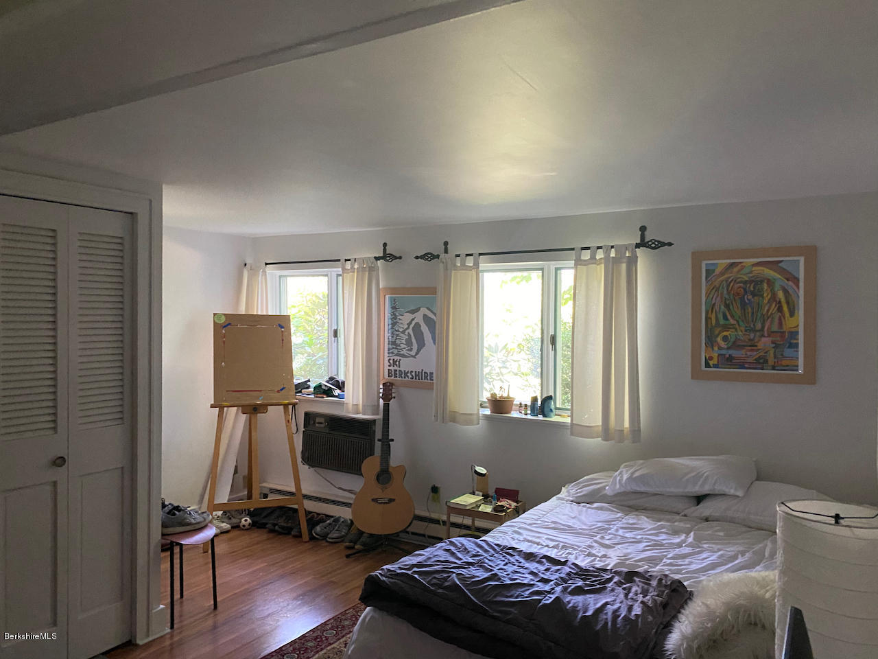 30 Prospect Hill Road Stockbridge, MA 01262 - Photo 16 of 19 a bedroom that has a bed and a chair in it
