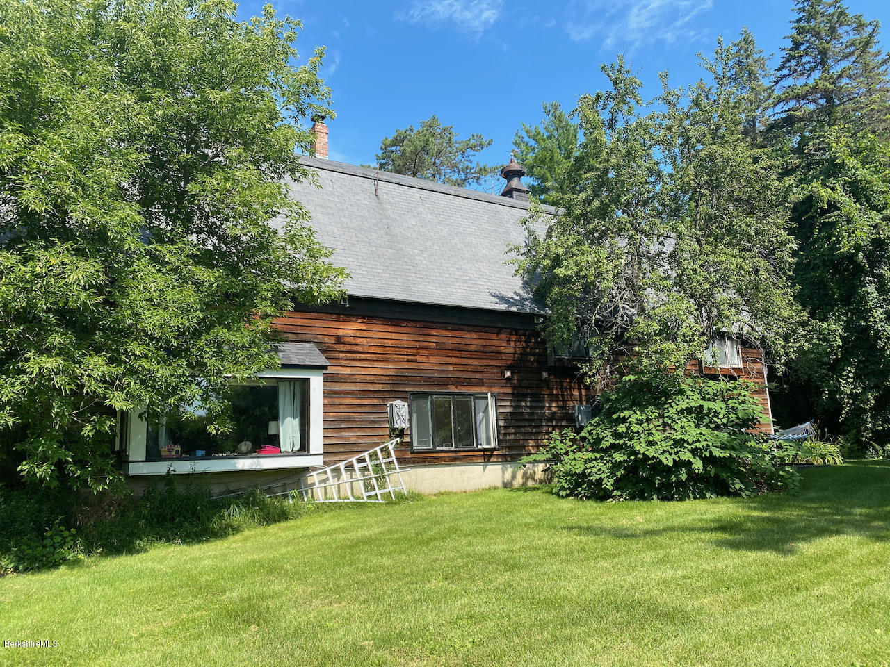 30 Prospect Hill Road Stockbridge, MA 01262 - Photo 4 of 19 a view of a house with a yard