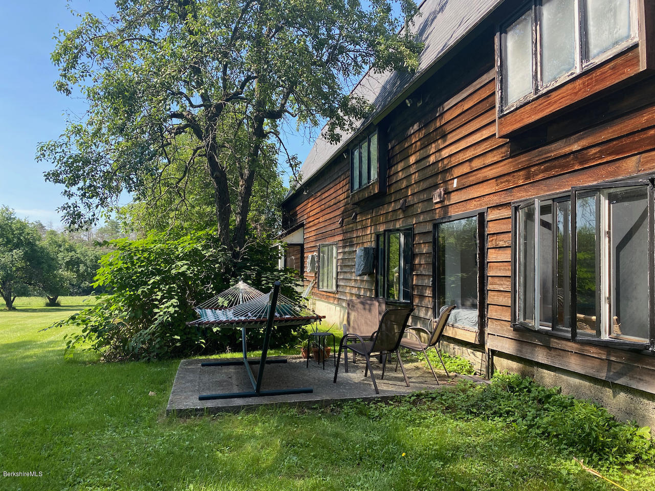 30 Prospect Hill Road Stockbridge, MA 01262 - Photo 5 of 19 a view of a house with a yard and sitting area